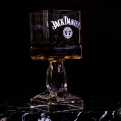 Handmade Jack Daniels whiskey glass crafted from repurposed bottle by artists Lanchi and Eli Moreno