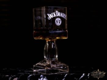 Handmade Jack Daniels whiskey glass crafted from repurposed bottle by artists Lanchi and Eli Moreno