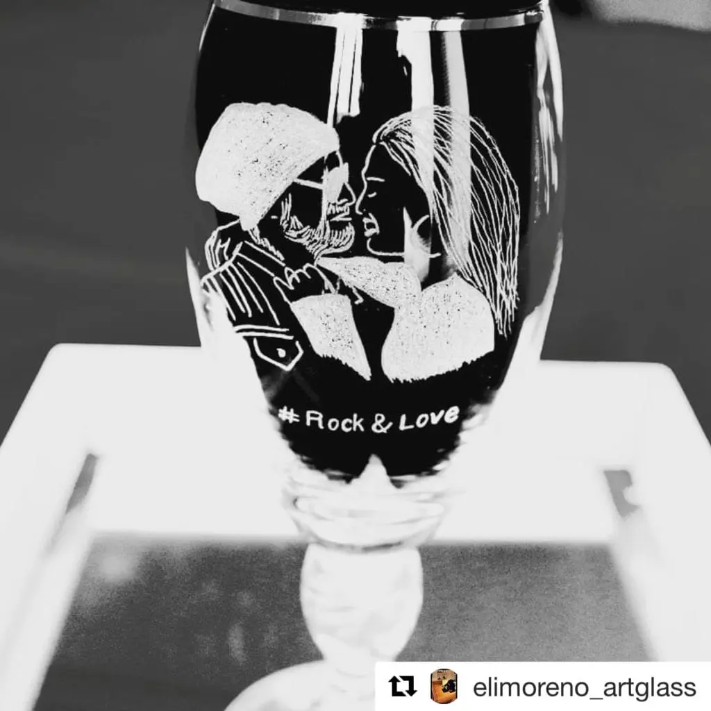 Custom engraved glass cup with artisanal etching