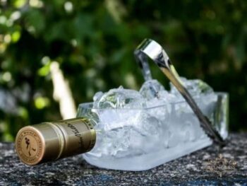 Handcrafted Johnnie Walker Gold ice bucket with custom engraving by Eli Moreno, sustainable recycled glass art