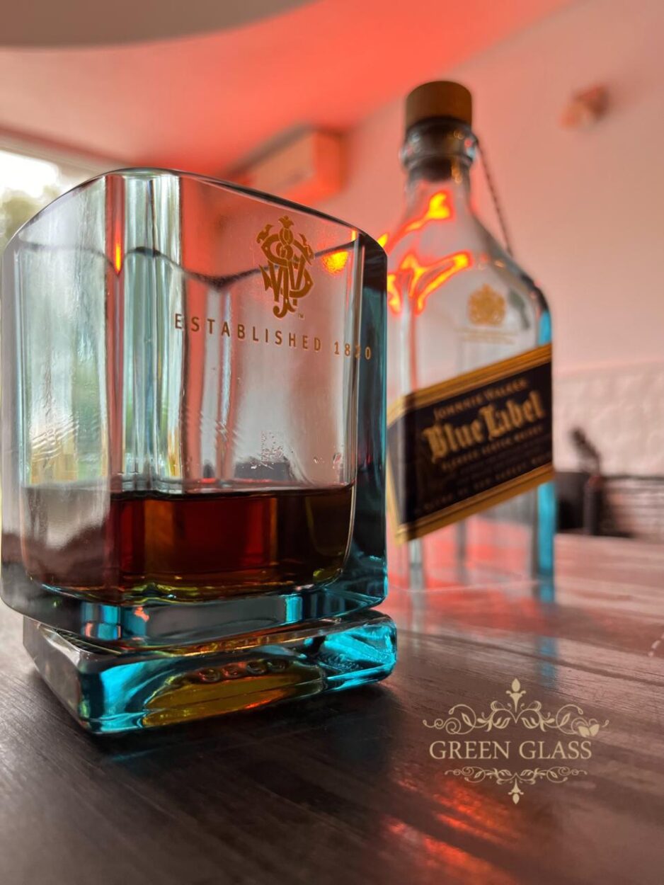 Handcrafted luxury whiskey glass with custom spinning base