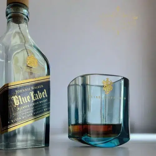 Handcrafted Blue Extreme whisky glass by Lanchi alongside its original Johnnie Walker Blue Label bottle source.